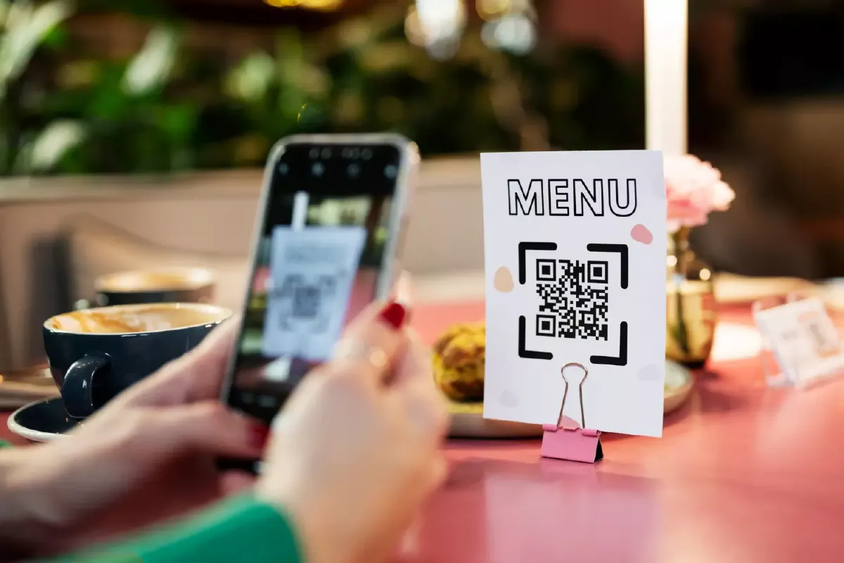 image of a user scanning a restaurant QR code